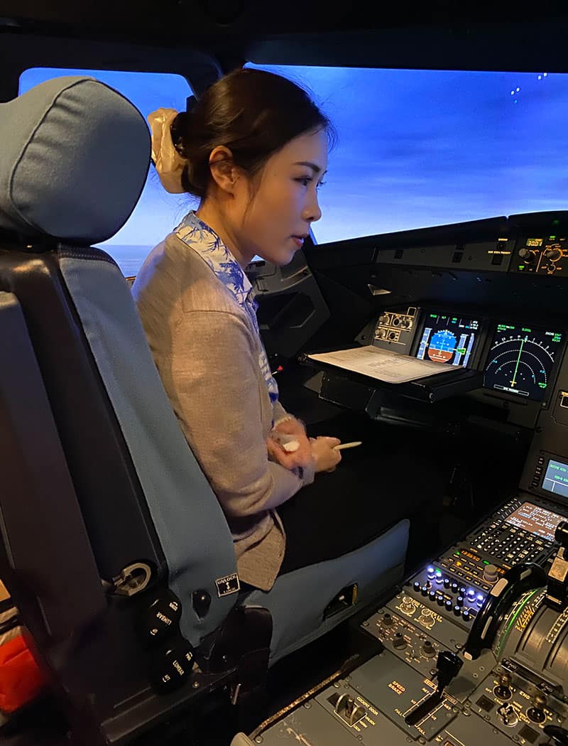Hui (Angel) Wang in the cockpit
